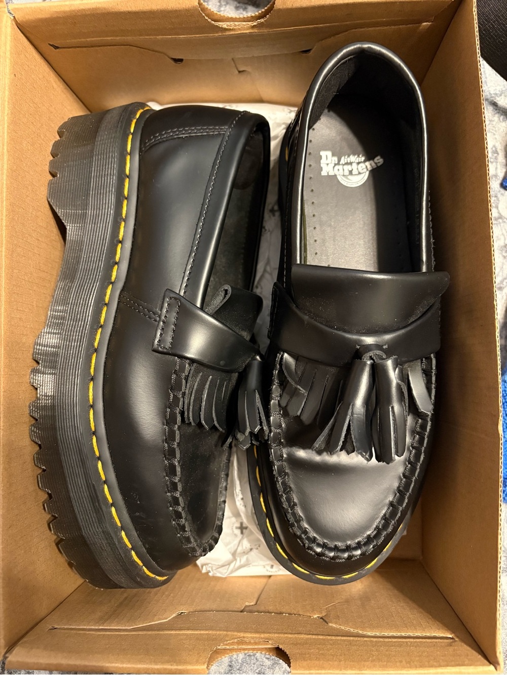 Dr. Martens Black Tassel Kiltie Lug Loafers with Yellow Stitching